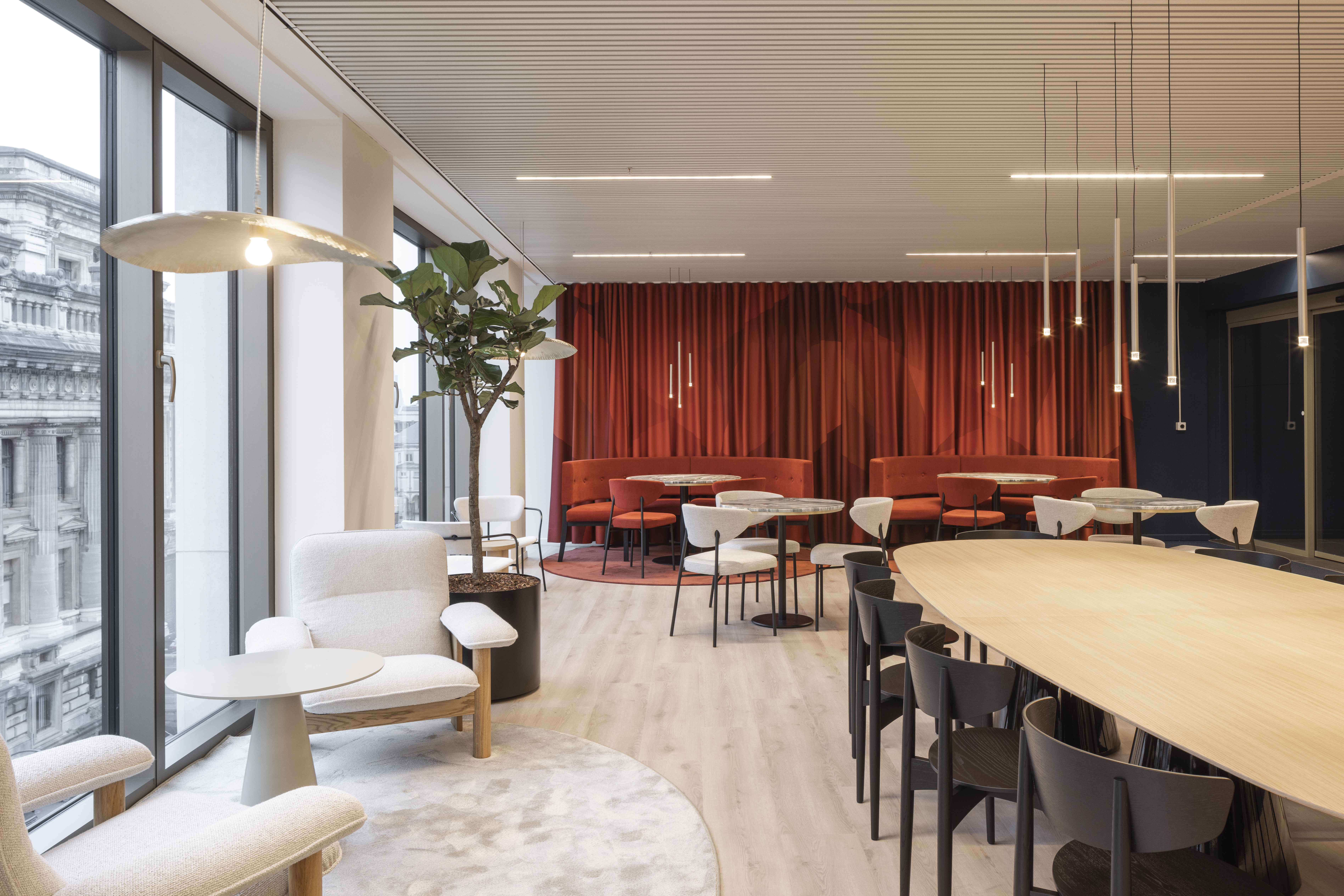 The group seating prominent at the Campari offices.