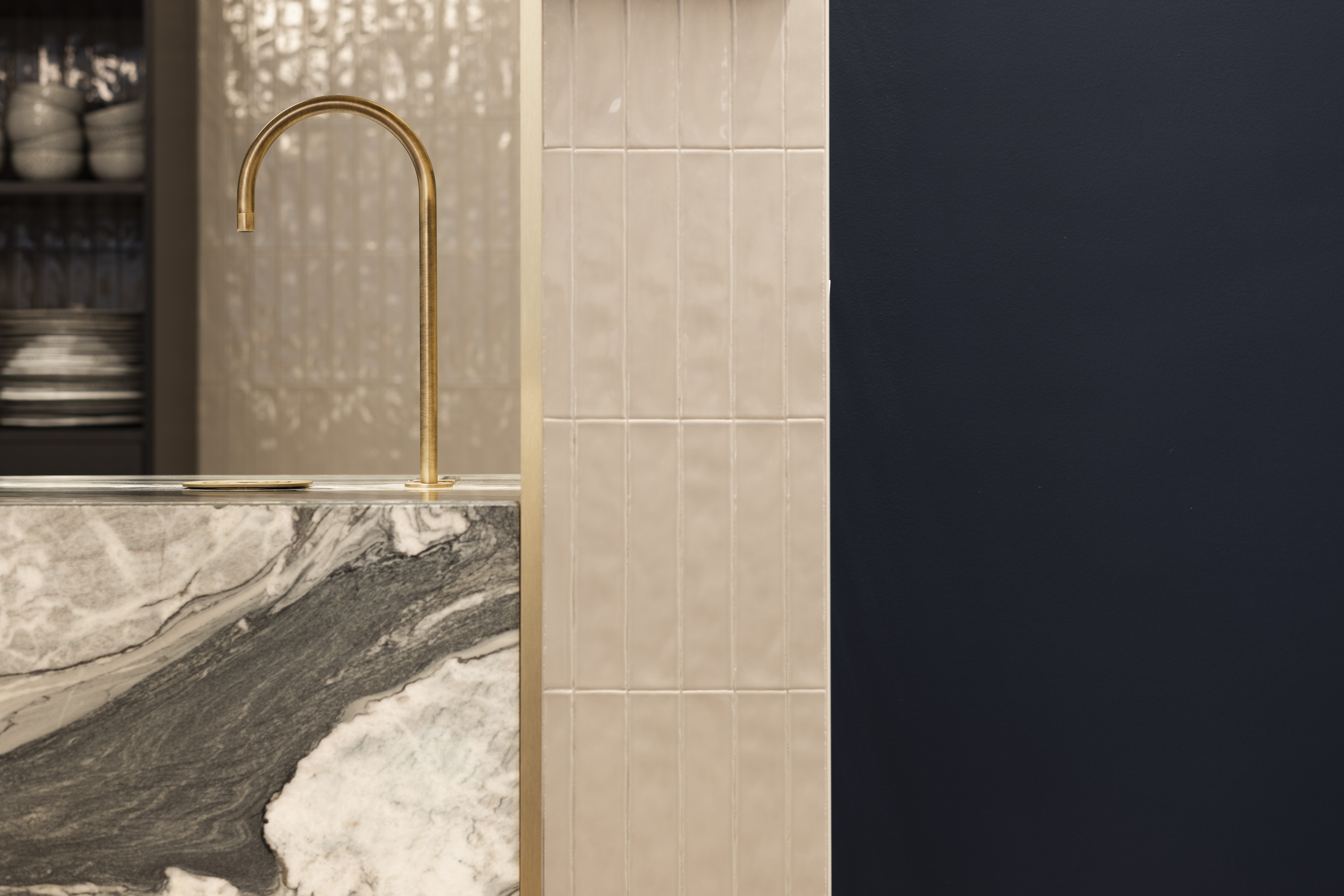 The space features brass hardware and marble.