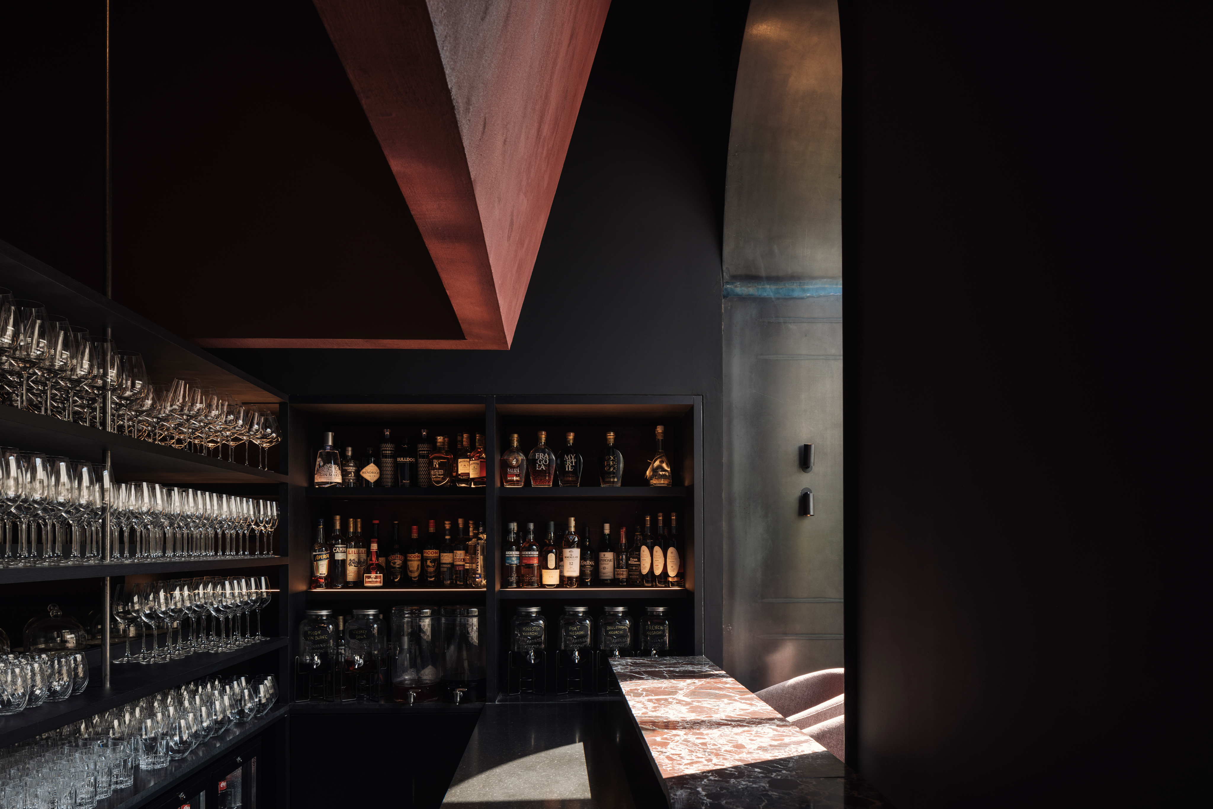 CULT is a gastronomic restaurant in Bruges, featuring a moody bar.