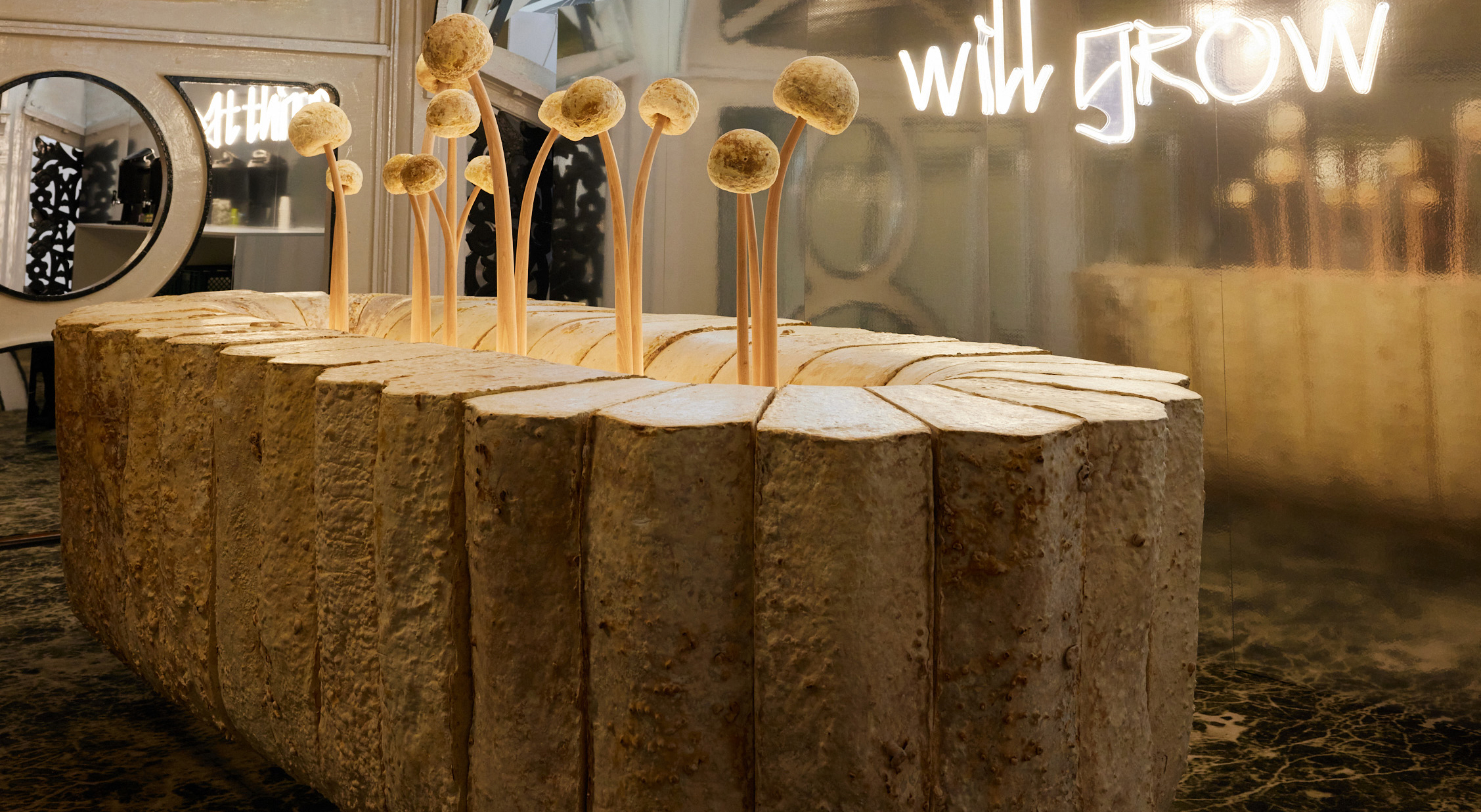 Mushrooms sprouting from the table focal point.